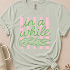 In a While Crocodile T-shirt