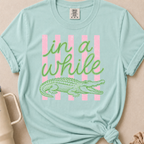 In a While Crocodile T-shirt