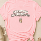 Surviving Motherhood One Coffee at a Time T-Shirt