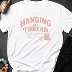 Hanging by a Thread But it's a Cute Thread T-Shirt