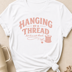 Hanging by a Thread But it's a Cute Thread T-Shirt